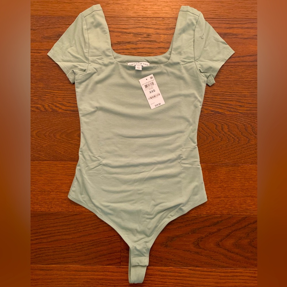 Women’s bodysuit size XXS. New with tags.